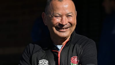 England head coach Eddie Jones smiles as he arrives for the captain's run at Coogee Oval in Sydney. AFP