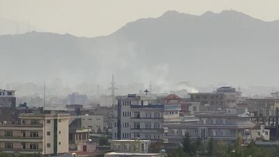 Smoke billows after an explosion near the Hamid Karzai International Airport, in Kabul on August 29, 2021. EPA