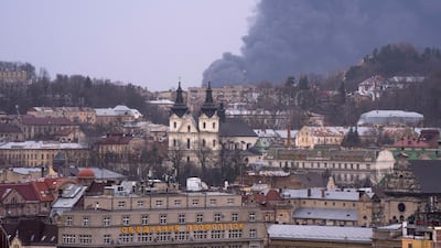 Smoke rises in Lviv, western Ukraine, on Saturday. AP Photo