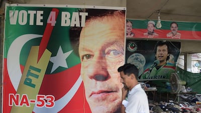 A campaign poster of cricketer-turned politician Imran Khan, who swept to victory in Wednesday's election. AFP Photo