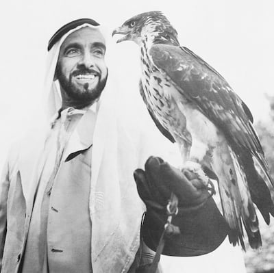 Sheikh Zayed holds a falcon. Photo: Alittihad