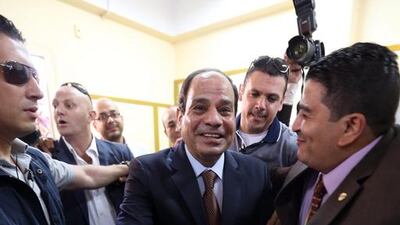Egypt's former army chief Abdel Fattah El Sisi casts his vote in the Egyptian presidential elections at a polling station in Cairo on Monday. Khaled Elfiqi / EPA