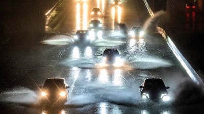 Drivers tackle a waterlogged motorway near San Francisco, California, after a bomb cyclone hit the US state. AFP