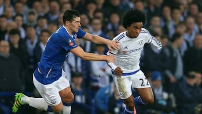 Willian of Chelsea and Gareth Barry of Everton compete for the ball during the FA Cup sixth round match between Everton and Chelsea at Goodison Park on March 12, 2016 in Liverpool, England. (Photo by Chris Brunskill/Getty Images)