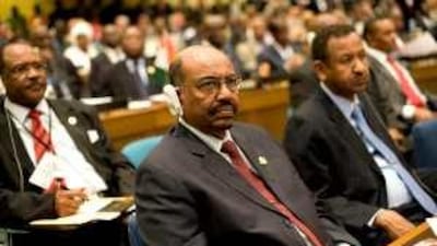 Sudan's president Omar al Bashir, centre, has been indicted for war crimes.
