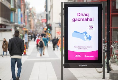 A billboard with information about coronavirus in Somali in Stockholm, Sweden April 1, 2020. TT News Agency via Reuters