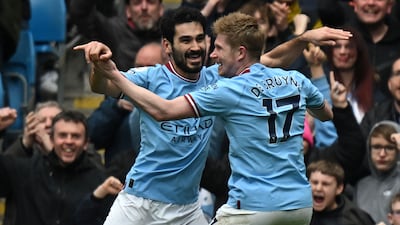 Manchester City's Ilkay Gundogan, left, and Kevin De Bruyne both scored in a 4-1 win over Liverpool in their Premier League match at the Etihad Stadium on Saturday, April 1, 2023. AFP