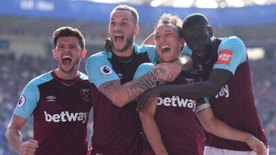 Centre midfield: Mark Noble (West Ham) – The captain secured survival for West Ham with a technically-superb volley to clinch victory at Leicester. Laurence Griffiths / Getty Images