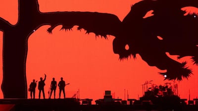 Members of U2 kick off their world tour of the Joshua Tree in Vancouver, B.C., Friday, May 12, 2017. Jonathan Hayward/The Canadian Press via AP