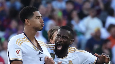 Real Madrid's Jude Bellingham celebrates scoring their first goal with Antonio Rudiger in the 2-1 Clasico win against Barcelona at the Estadi Olimpic Lluis Companys on October 28, 2023. Reuters