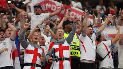 England fans celebrate the 4-2 win over Croatia. AFP