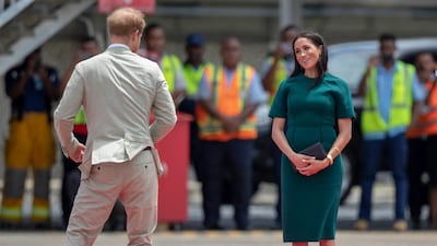 Meghan, Duchess of Sussex, wears Jason Wu and Manolo Blahnik in Nadi, Fiji, on October 25, 2018. AP