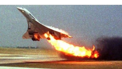 Air France Concorde Flight 4590 takes off with fire trailing from its engine on the left wing from Charles de Gaulle airport in Paris on July 25, 2000. Toshihiko Sato / AP Photo