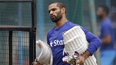 India cricketer Shikhar Dhawan leaves after batting in the nets during a training session at National Cricket Academy in Bangalore, India, Thursday, June 30, 2016. Aijaz Rahi / AP Photo