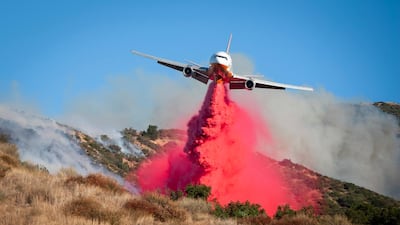 A large air tanker drops fire retardant on the Saddleridge Fire in Sylmar, California, USA. According to the latest reports the fire is progressing quickly due to the strong winds, prompting an evacuation of the nearby inhabitants. EPA