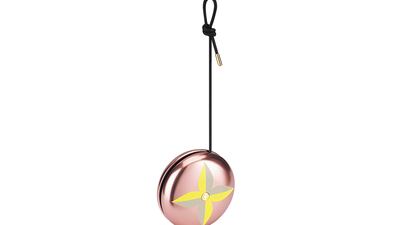 Play time: a yo-yo, part of the Joy of Gaming category, features a monogram flower. Courtesy Louis Vuitton