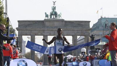 Kenenisa Bekele of Ethiopia crosses the finish line to win the men's Berlin Marathon in Germany on September 25, 2016. Fabrizio Bensch / Reuters
