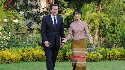Former UK prime minister David Cameron meeting Suu Kyi at her Lakeside Villa in Rangoon, on April 13, 2012. PA