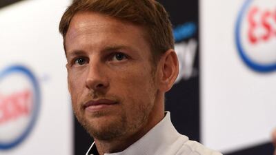 McLaren Formula One driver Jenson Button shown at a promotional event on Wednesday in Singapore ahead of Sunday's Singapore Grand Prix. Roslan Rahman / AFP / September 16, 2015