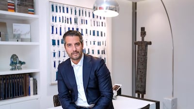 Art collector Mohammed Afkhami with his collection of Iranian Art at his home at Burj Daman. Victor Besa / The National