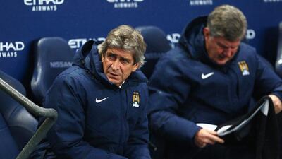 Manchester City manager Manuel Pellegrini observes his side during their 3-2 Premier League win over Sunderland on Thursday. Clive Mason / Getty Images / January 1, 2015
