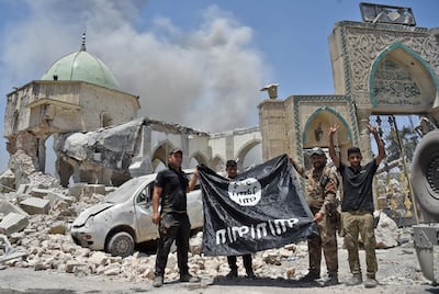Iraqi counter-terrorism troops stand outside the destroyed Al Nuri Mosque in the Old City of Mosul in June 30, 2017. AFP