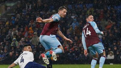 Cristian Romero 6 - Outmuscled Weghorst as Burnley’s January signing charged into the box and was about to unleash the ball from his feet. Beaten in the air by Mee. Reuters