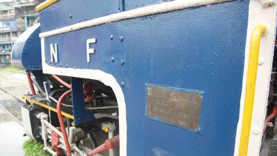 A close-up of the vintage steam engine