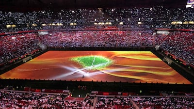 Fans watch the opening ceremony of the FIFA Arab Cup 2021 at the Al Bayt Stadium. AFP