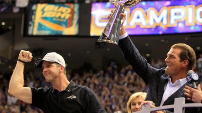 Baltimore Ravens head coach John Harbaugh (L) celebrates as team owner Steve Bisciotti holds up the Vince Lombardi Trophy after defeating the San Francisco 49ers in the NFL Super Bowl XLVII football game in New Orleans, Louisiana, February 3, 2013. REUTERS/Sean Gardner (UNITED STATES - Tags: SPORT FOOTBALL) *** Local Caption *** NEO818_NFL-SUPERBOW_0204_11.JPG