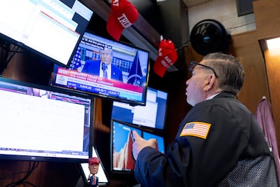 A trader works on the floor of the New York Stock Exchange on Monday. EPA