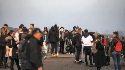 People gather at the top of at Parliament Hill viewpoint in Hampstead Heath on November 7 in London during the second national lockdown. Getty Images
