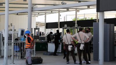 Security gates being set up at the Dubai South site. Pawan Singh / The National