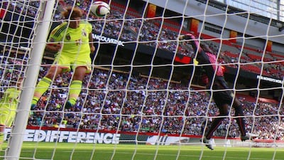 Yuika Sugasawa of Japan heads the ball in for her team's second, winning goal against Cameroon on Friday in a 2-1 Women's World Cup Group C victory. Jeff Vinnick / Getty Images / AFP / June 12, 2015