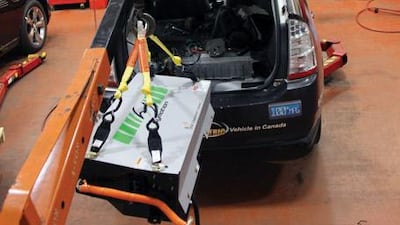 The new battery occupies the space normally reserved for the spare tyre - and requires five hours for a full recharge.