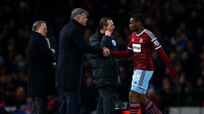 West Ham United manager Sam Allardyce shakes hands with winning goalscorer Diafra Sakho as he subs off in Saturday's Premier League win against Sunderland. Ian Walton / Getty Images