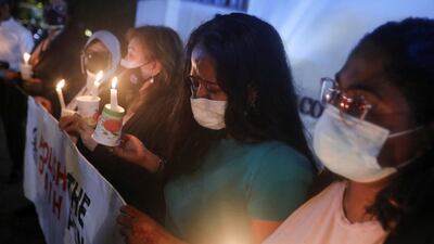 Angelia Pranthaman, sister of Pannir Selvam Pranthaman, another Malaysian drug trafficker facing death sentence, cries at the vigil for Nagaenthran Dharmalingam in Kuala Lumpur. Reuters