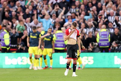 A dejected Luke Thomas after Sheffield United conceded the fourth goal against Newcastle. Getty