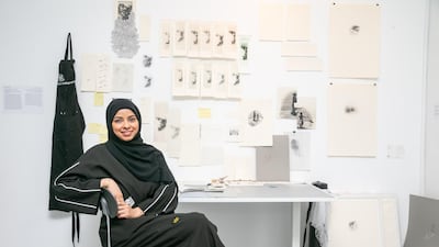 Salama Nasib in the replica of her studio for Tashkeel’s The Alumni Return. Courtesy Tashkeel