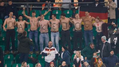Germany fans show a thank you message for former Germany head coach Joachim Low. AFP