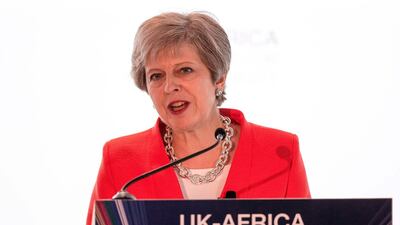 Mrs May said she wanted Britain to become the biggest investor in Africa out of the Group of Seven nations, overtaking the United States, NIC BOTHMA /AFP