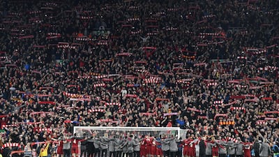 Liverpool players celebrate in front of their fans after the UEFA Champions League semi final. EPA