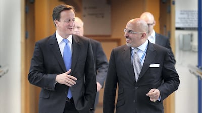 Conservative MP Nadhim Zahawi (R) pictured at the Conservative Party Conference in 2010 with then British prime minister, David Cameron. (Peter Macdiarmid/Getty Images)