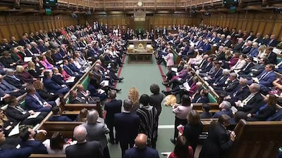 The benches filled with MPs during the debate. PA