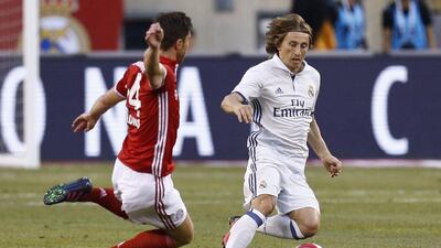 Luka Modric of Real Madrid drives by Xabi Alonso of Bayern Munich during their International Champions Cup match at MetLife Stadium on August 3, 2016 in East Rutherford, New Jersey. Jeff Zelevansky / Getty Images / AFP