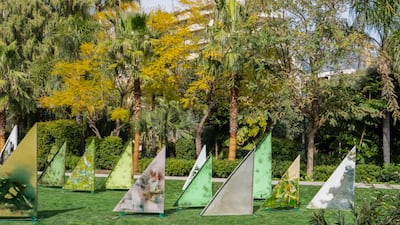 The 30 triangular metal sheets, resembling sailboats, have been painted and burned, causing the paint to bubble and take on new forms and colours. Photo: Studio Jean Boghossian