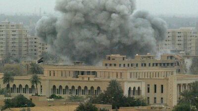 Smoke billows from an explosion behind a government building in the presidential compound in Baghdad, in 2003. AFP