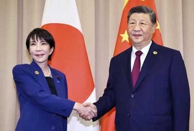 Chinese President Xi Jinping and Japanese Prime Minister Sanae Takaichi pictured in South Korea on October 31. The issue of Taiwan has strained relations between the two countries. AP
