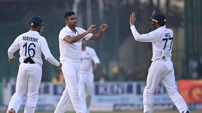 India celebrate after Ravichandran Ashwin claimed the wicket of New Zealand opener Will Young for two in the tourists' second innings. AFP