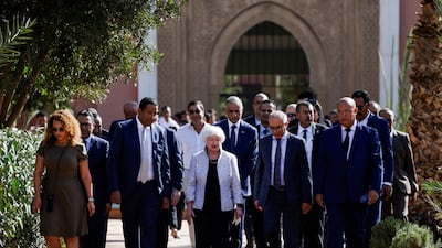 US Treasury Secretary Janet Yellen, centre, walks next to Moroccan Education Minister Chakib Benmoussa, centre right, during her visit to a school in Marrakesh. Reuters